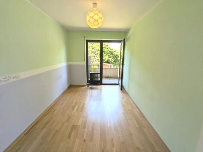 2. OG: Kinderzimmer I mit Balkonzugang