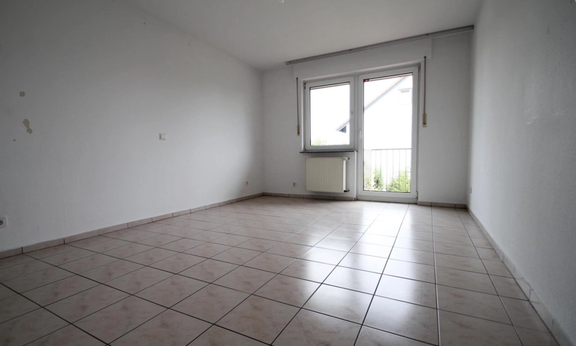 Obergeschoss -Schlafzimmer mit Zugang auf den Balkon