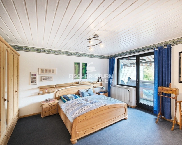 Schlafzimmer mit Balkon