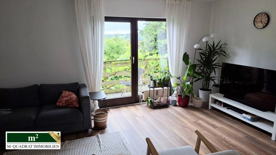 Wohnzimmer mit Balkon EG