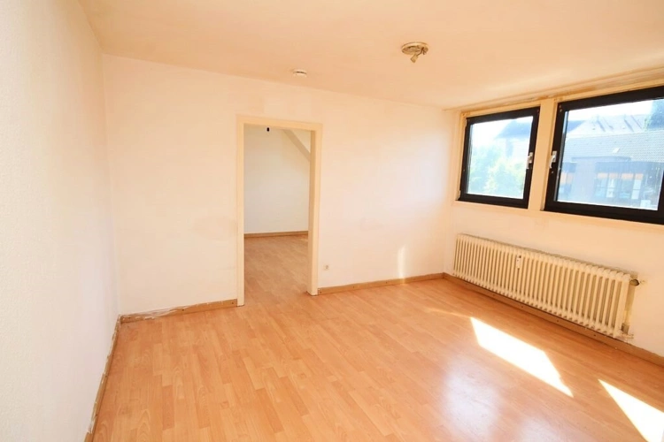 Dachgeschosswohnung in Haus Nr. 153