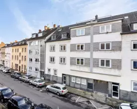 1,5-Zimmer-Rohbauwohnung mit Südbalkon in gepflegtem Altbau